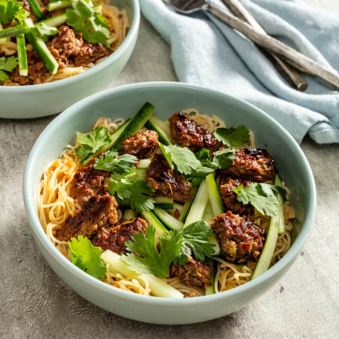 Rice Noodle Bowl with PlantBased ScallionMeat Patties and Cucumber