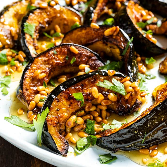 Roasted Acorn Squash with Pine Nuts, Honey, and Parsley