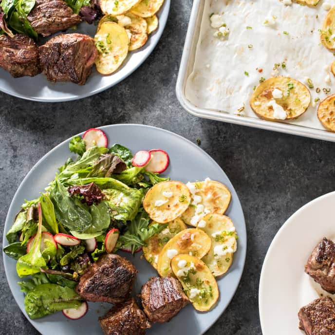 Skillet Steak Tips with Cheesy Roasted Potatoes and Mesclun Salad