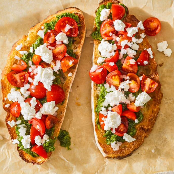 Tomato Bruschetta with Arugula Pesto and Goat Cheese