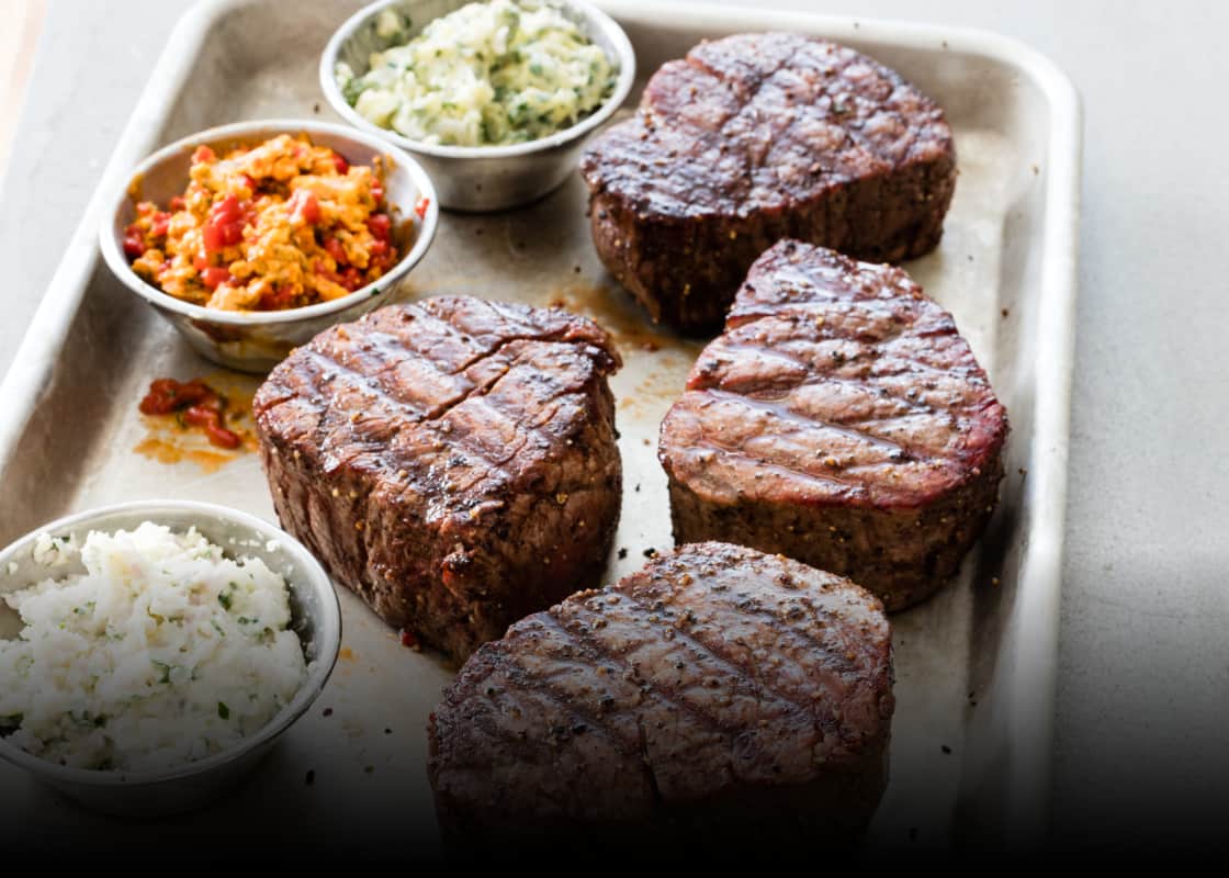 Filet mignon on charcoal grill top