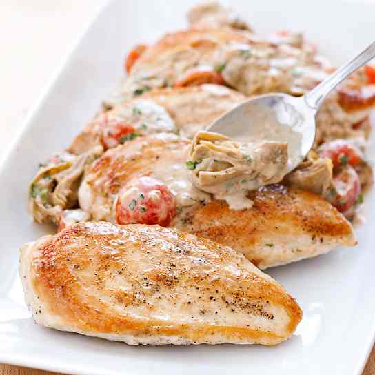 Chicken in Creamy Parmesan Sauce with Artichokes and Tomatoes