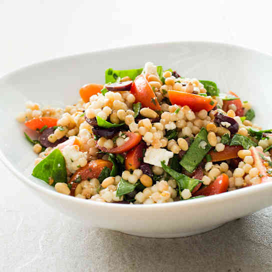 Pearl Couscous with Tomatoes, Olives, and Ricotta Salata