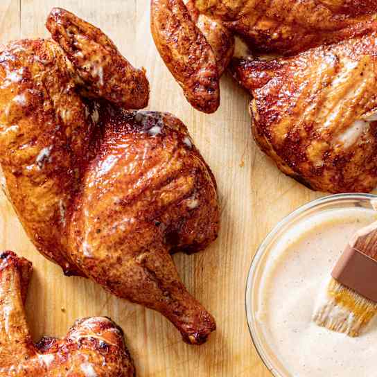 Alabama BBQ Chicken on a Charcoal Grill