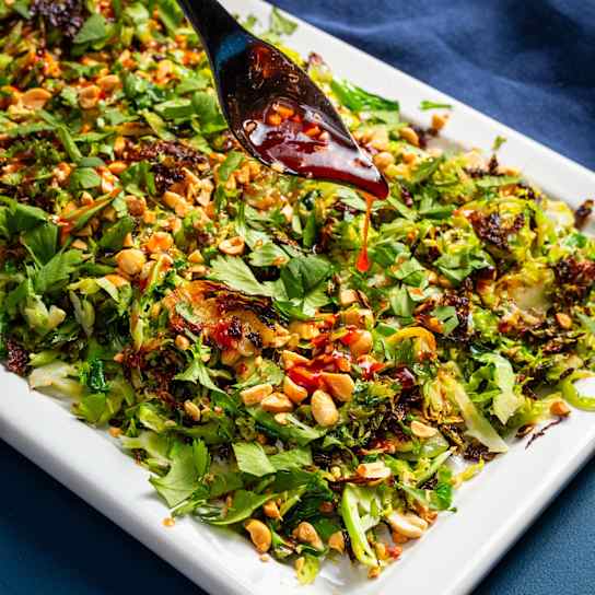 Charred Shaved Brussels Sprout Salad with Sweet Chili–Lime Dressing