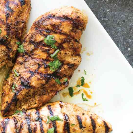 Grilled Chipotle-Lime Chicken Breasts on a Charcoal Grill