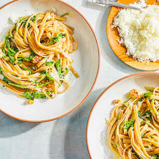 Pasta with Roasted Garlic Sauce, Arugula, and Walnuts