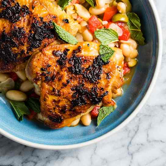 Roasted Chicken Thighs with Harissa and Cannellini Beans