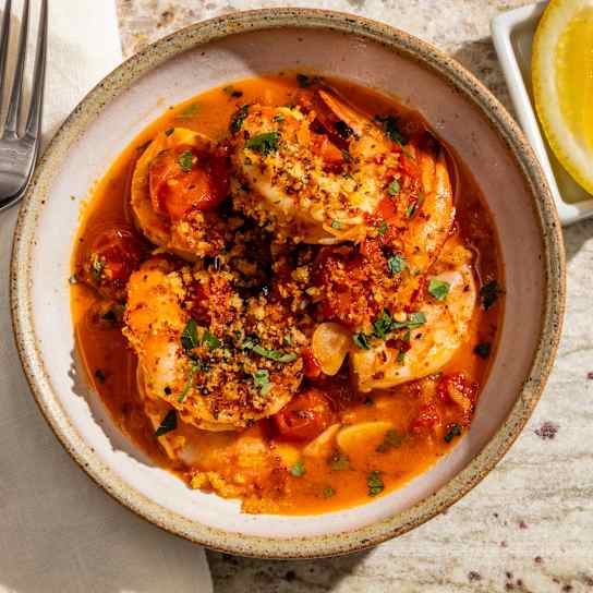 Shrimp in Spicy Confit Tomato Sauce with Herbed Anchovy Breadcrumbs