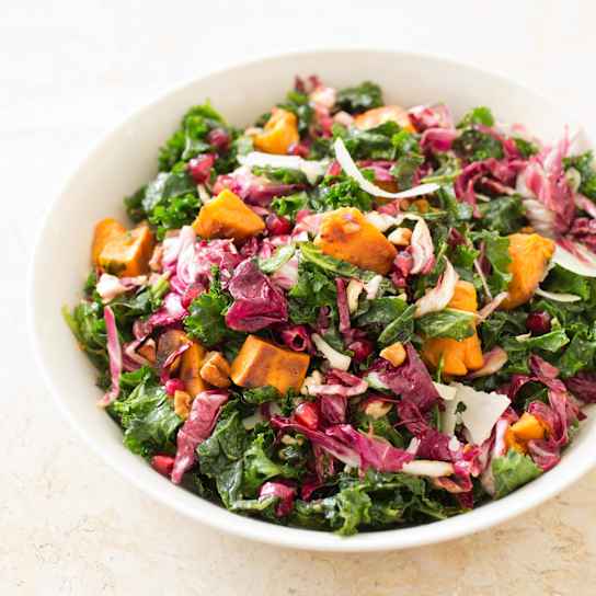Kale Salad with Roasted Sweet Potatoes and Pomegranate Vinaigrette