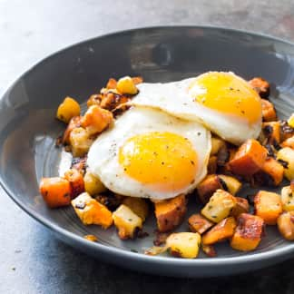 Paleo Sweet Potato and Celery Root Hash with Fried Eggs