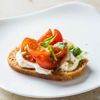 Ricotta Crostini with Cherry Tomatoes and Basil