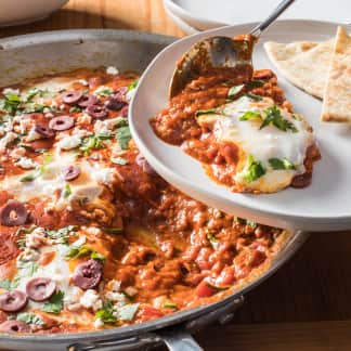 Shakshuka (Eggs in Spicy Tomato and Roasted Red Pepper Sauce)