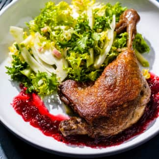 Frisée Salad with Duck Leg Confit and Cranberry Gastrique