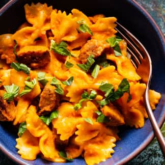 Bowties with Creamy Carrot Sauce and Italian Sausage