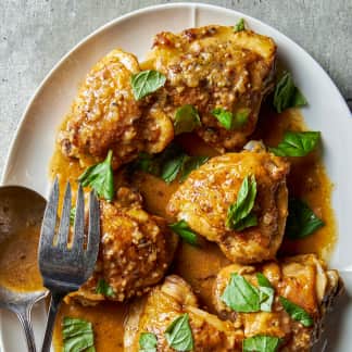 Braised Chicken Thighs with Lemon, Spices, and Torn Basil