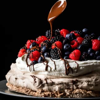 Chocolate Pavlova with Berries and Whipped Cream