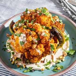 Grill-Roasted Whole Cauliflower with Tahini-Yogurt Sauce