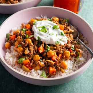 Rice Bowls with Harissa Beef, Chickpeas, and Olives