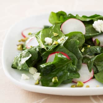 wilted spinach salad with oranges radishes and citrus vinaigrette