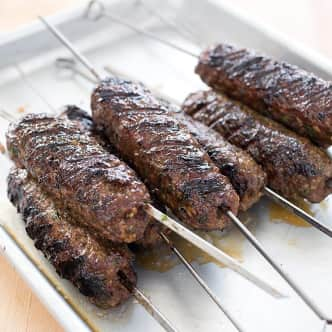 Grilled ground meat kebabs on skewers