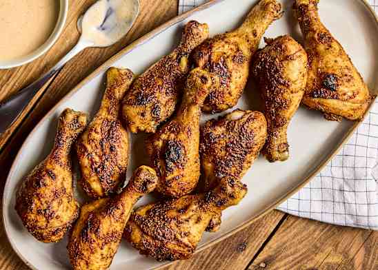 Barbecue Spice–Roasted Chicken Drumsticks with White Barbecue Sauce