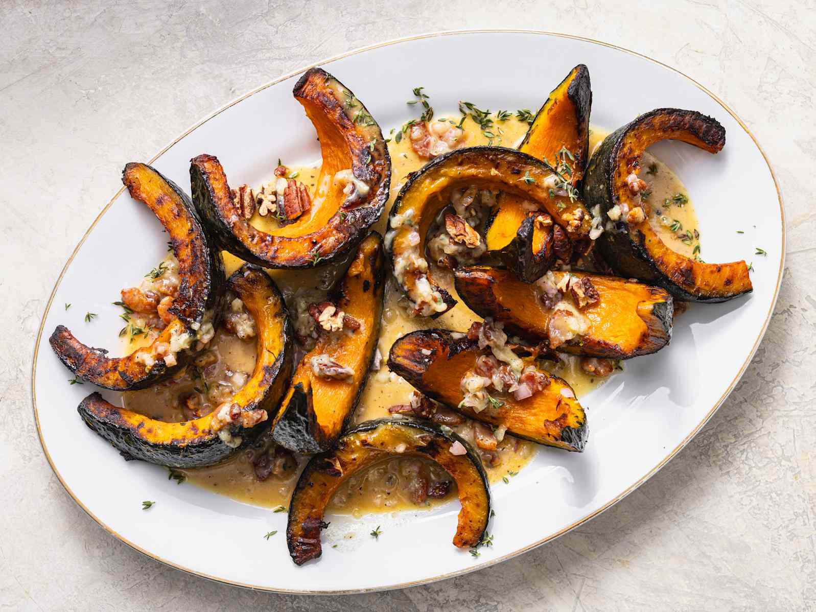 roasted kabocha squash topped with bacon and pecans