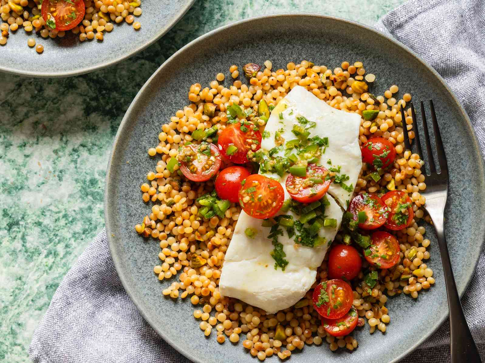 Poached Halibut with Pearl Couscous and Spicy Tomato Zhoug