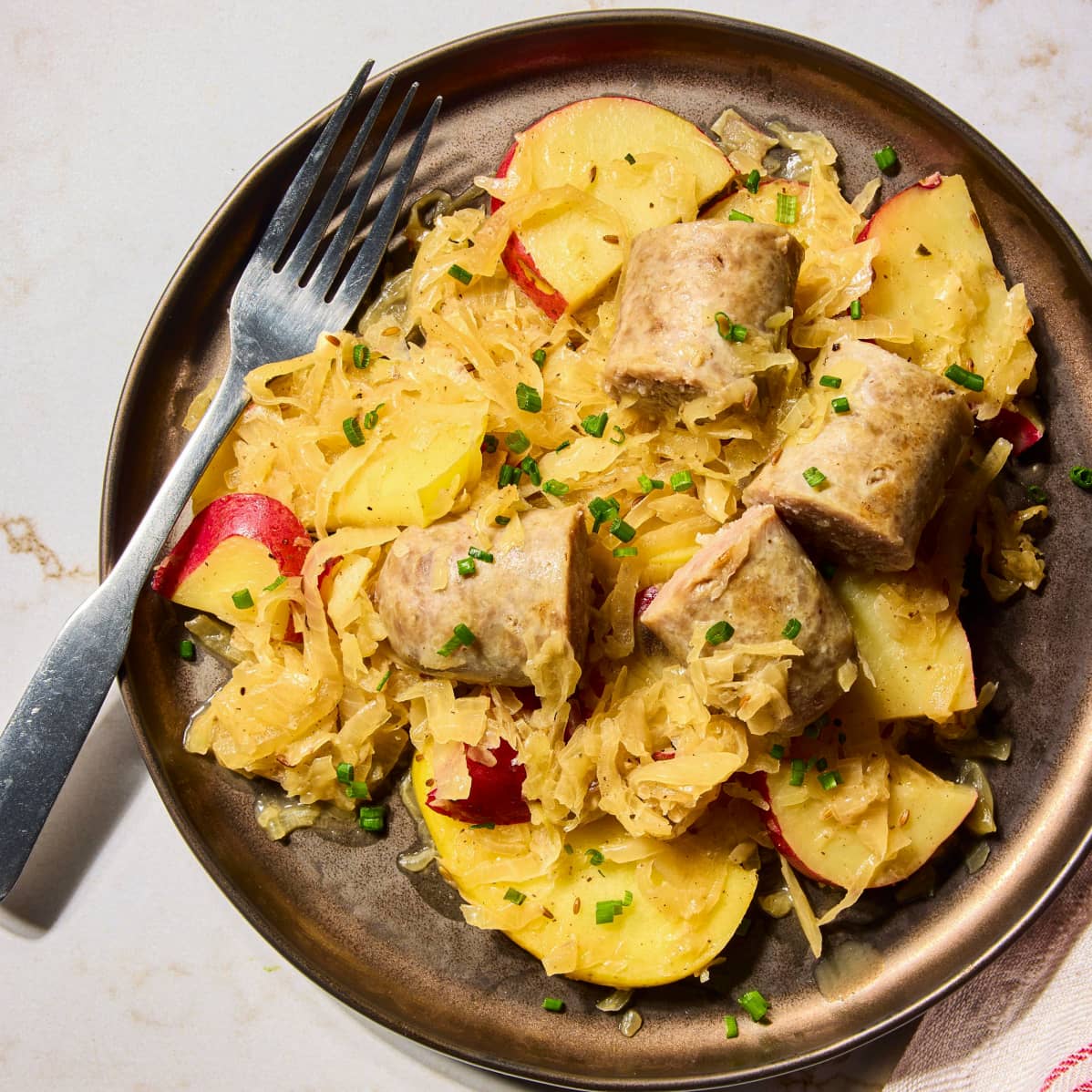 One-Pan Bratwurst with Potatoes, Apples, and Sauerkraut