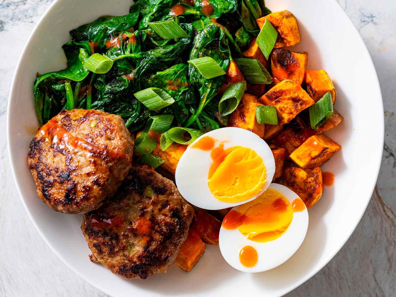 Turkey Sausage Bowls with Sweet Potatoes, Spinach, and Eggs
