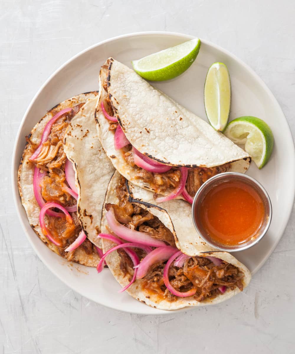 Incredibly tender slow-roasted pork shines in these citrusy tacos.
