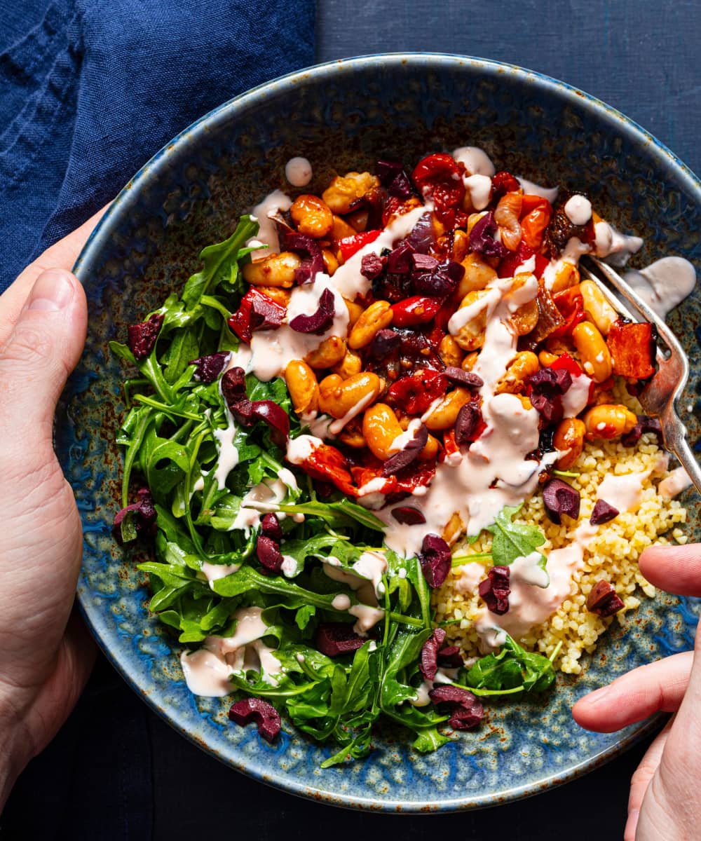 Beans and roasted vegetables make this grain bowl hearty enough for dinner.