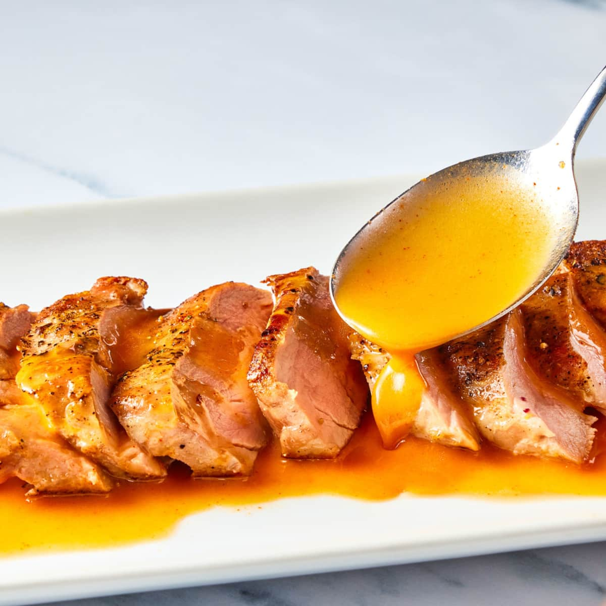 Pan-Seared Pork Tenderloin Steaks with Gochujang Beurre Monté