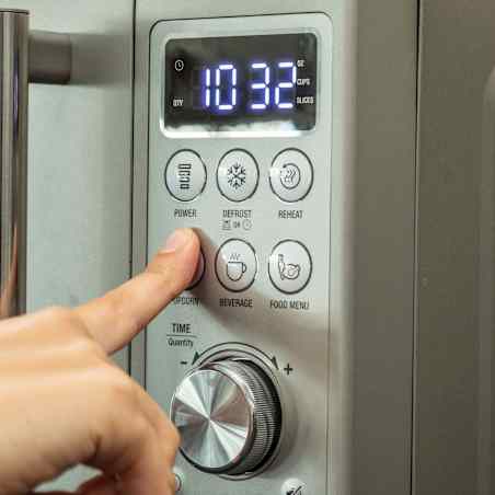 The matte silver control panel of a microwave with fingerprint-free finish