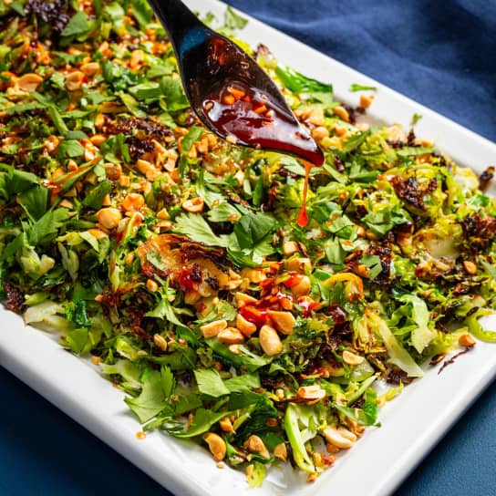 Charred Shaved Brussels Sprout Salad with Sweet Chili–Lime Dressing