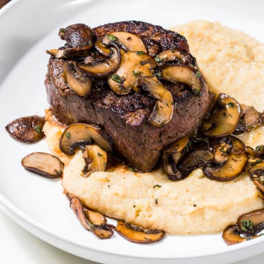 Filet Mignons with Sage-Buttered Mushrooms and Black Pepper Polenta