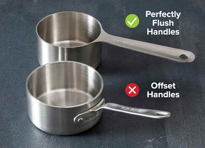 A side-by-side comparison of a dry measuring cup with a flush handle and one with a handle attached halfway down the cup.