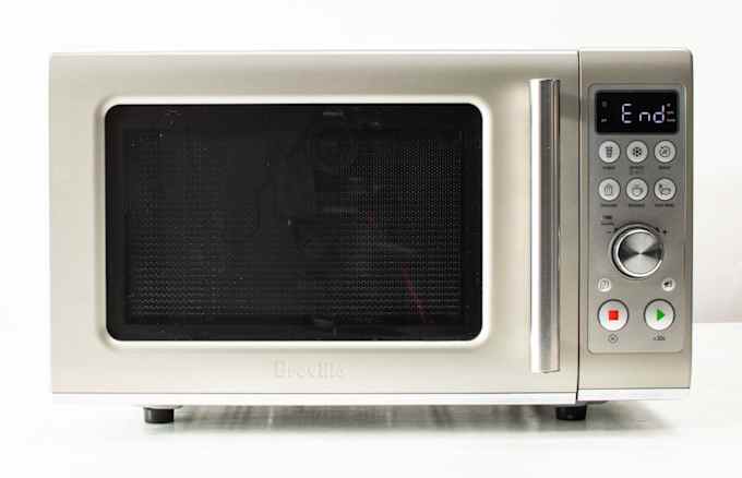 The display screen on a silver microwave displays “End”