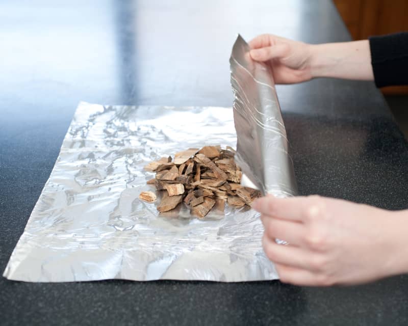 Wrap your wood chips in a foil packet.