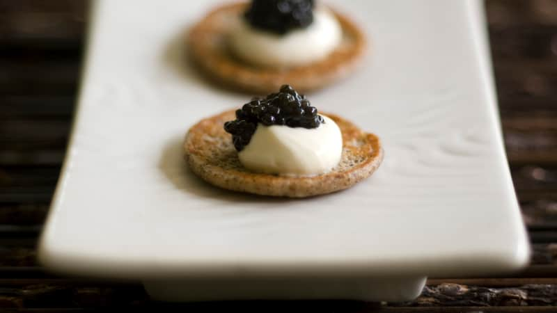 caviar on blini on a plate