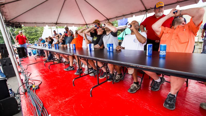 Beer-drinking contest at Cochon de Lait Festival