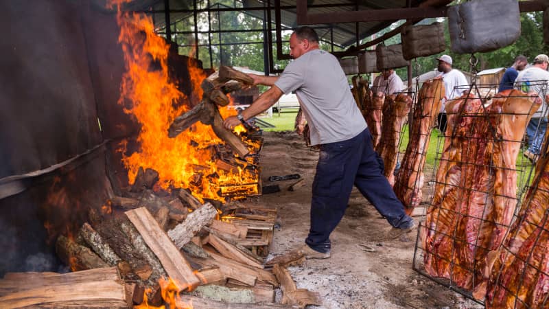 Stoking the fire at the Cochon de Lait Festival