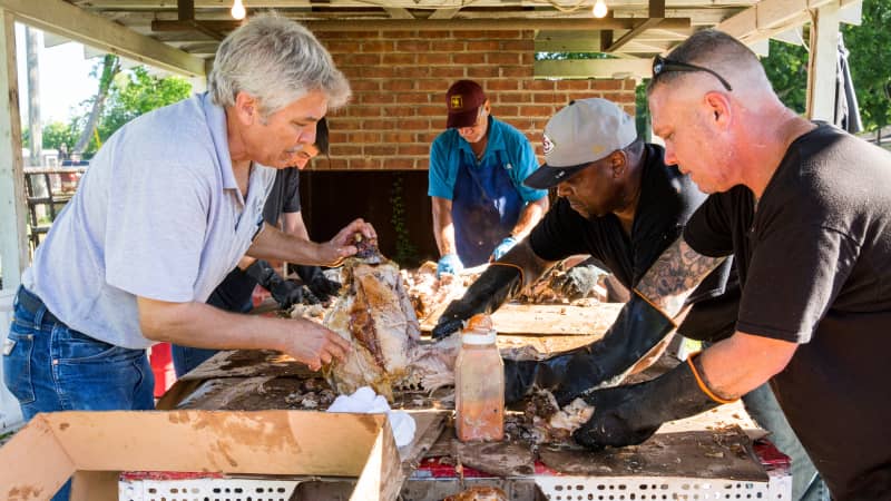 Shredding meat at Cochon de Lait Festival