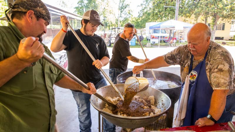 Stirring beef at the Cochon de Lait Festival