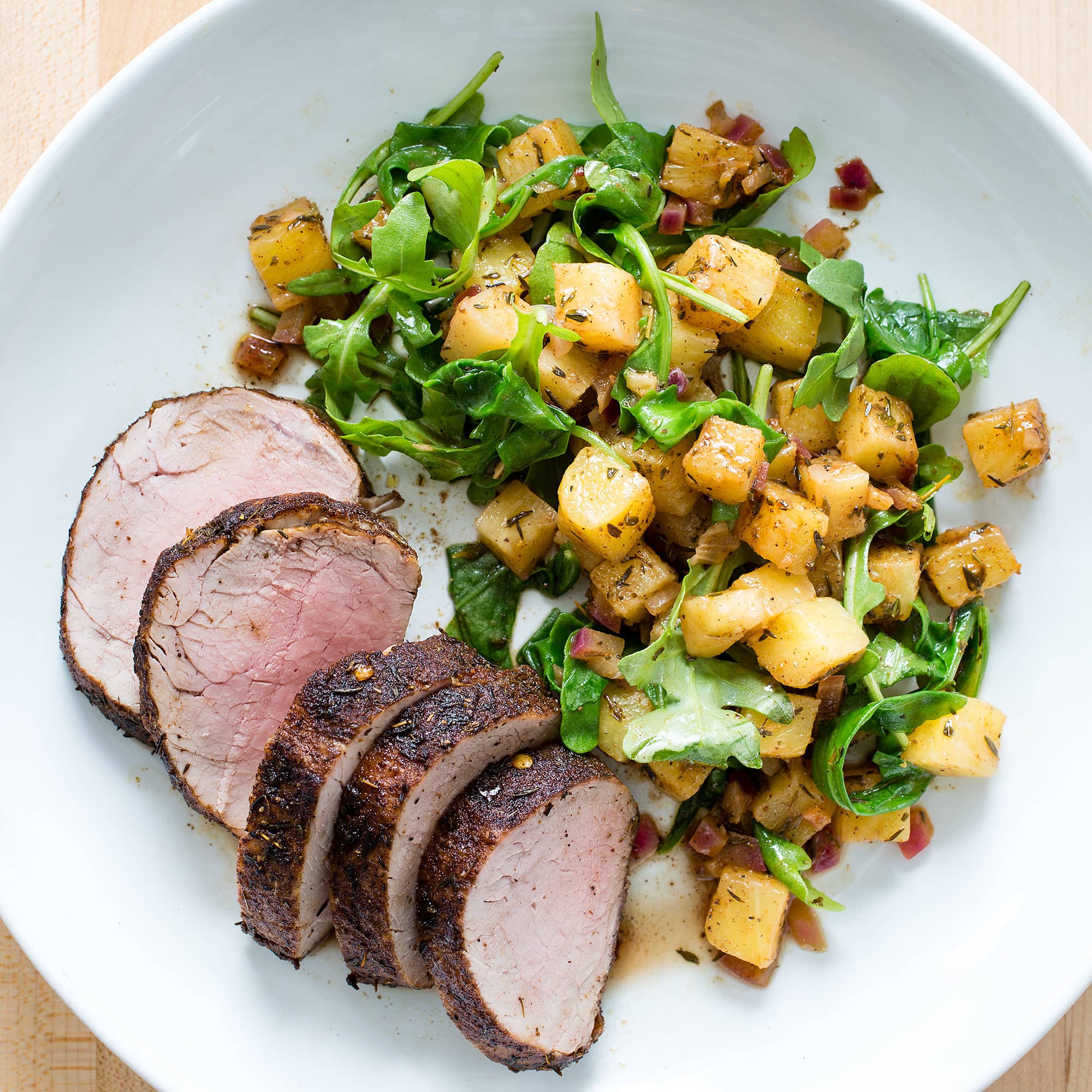 Jerk Pork Tenderloin with Arugula and Pineapple Salad | America's Test Kitchen