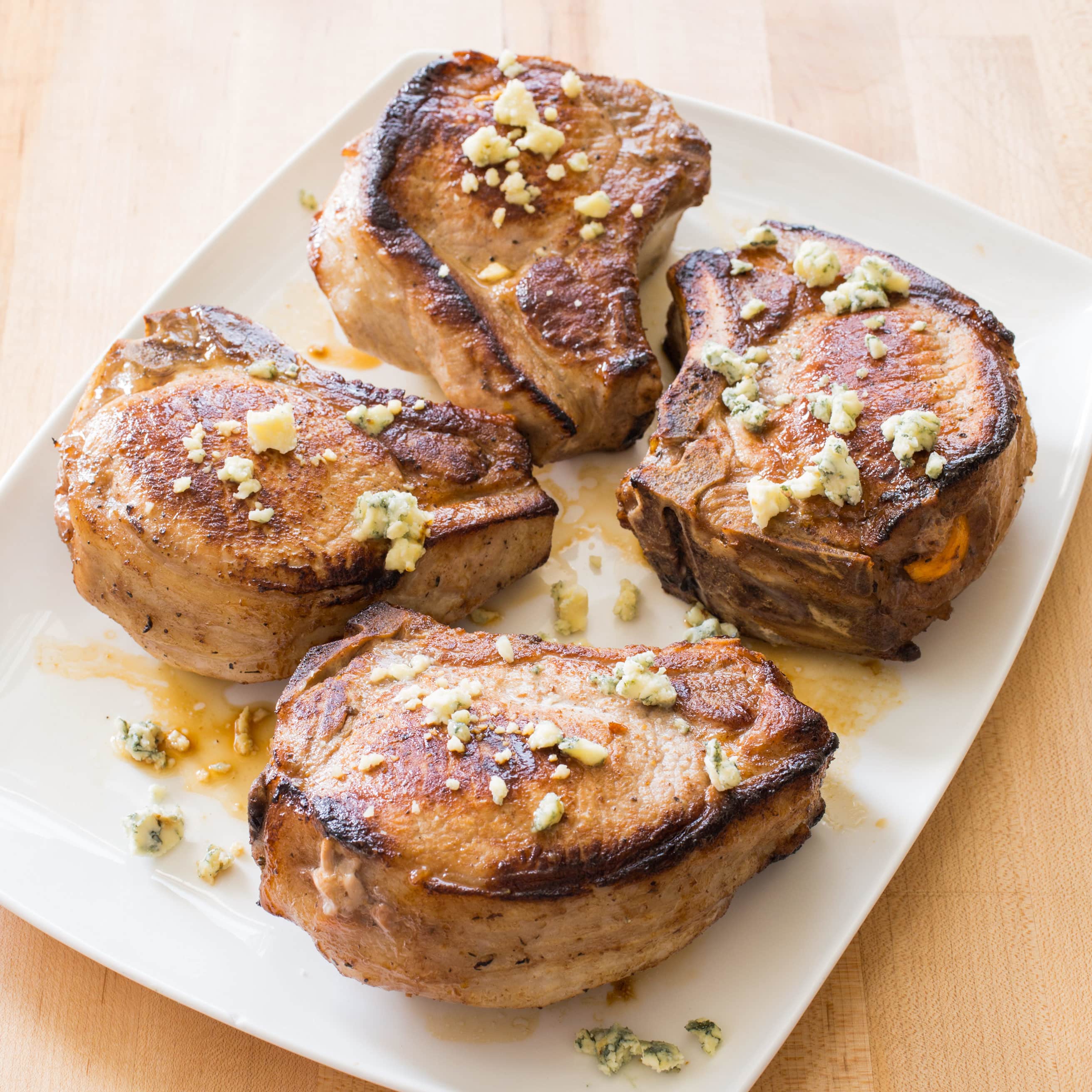 Stuffed Thick-Cut Pork Chops with Spinach and Fontina Stuffing | America's Test Kitchen