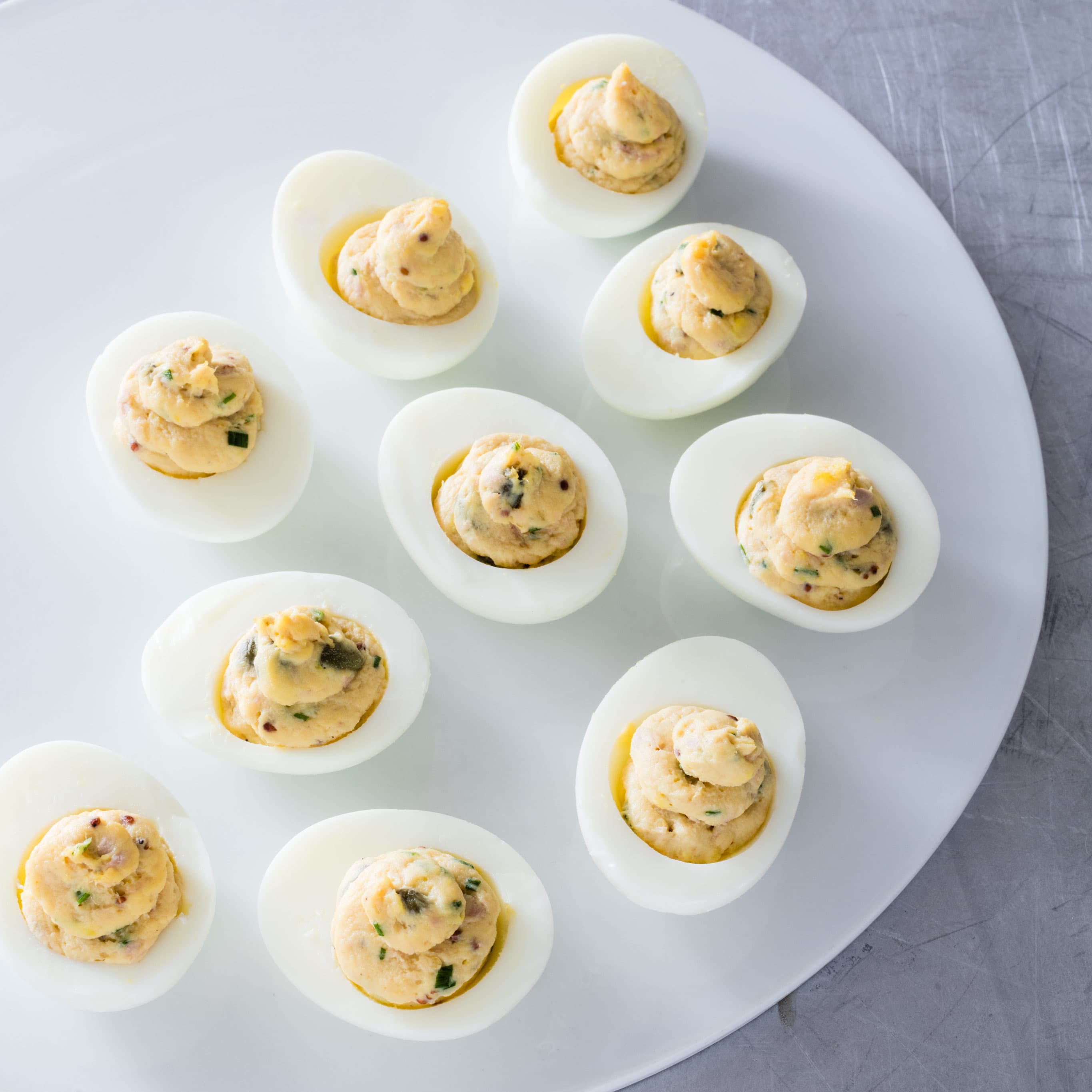 Deviled Eggs with Tuna, Capers, and Chives