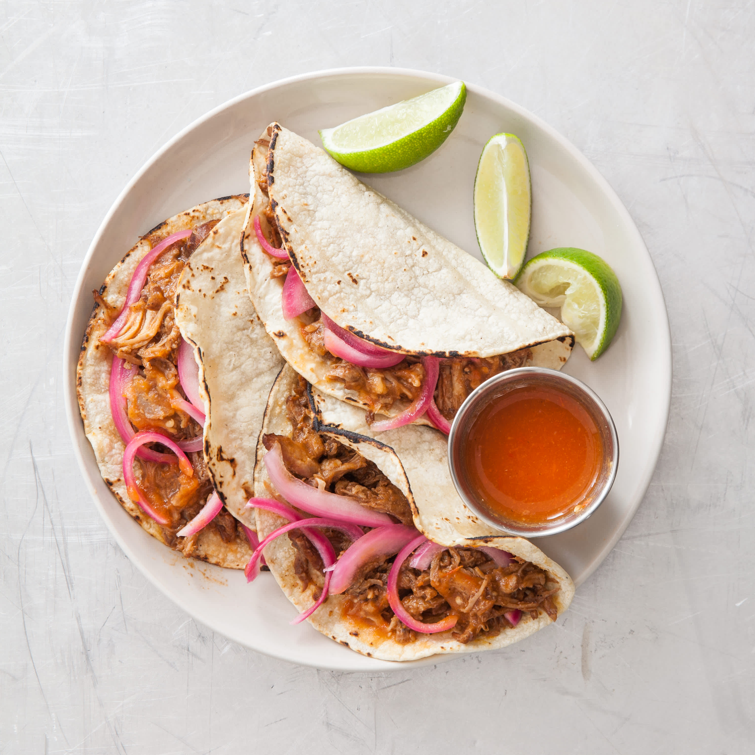 Citrus-Braised Pork Tacos | America's Test Kitchen