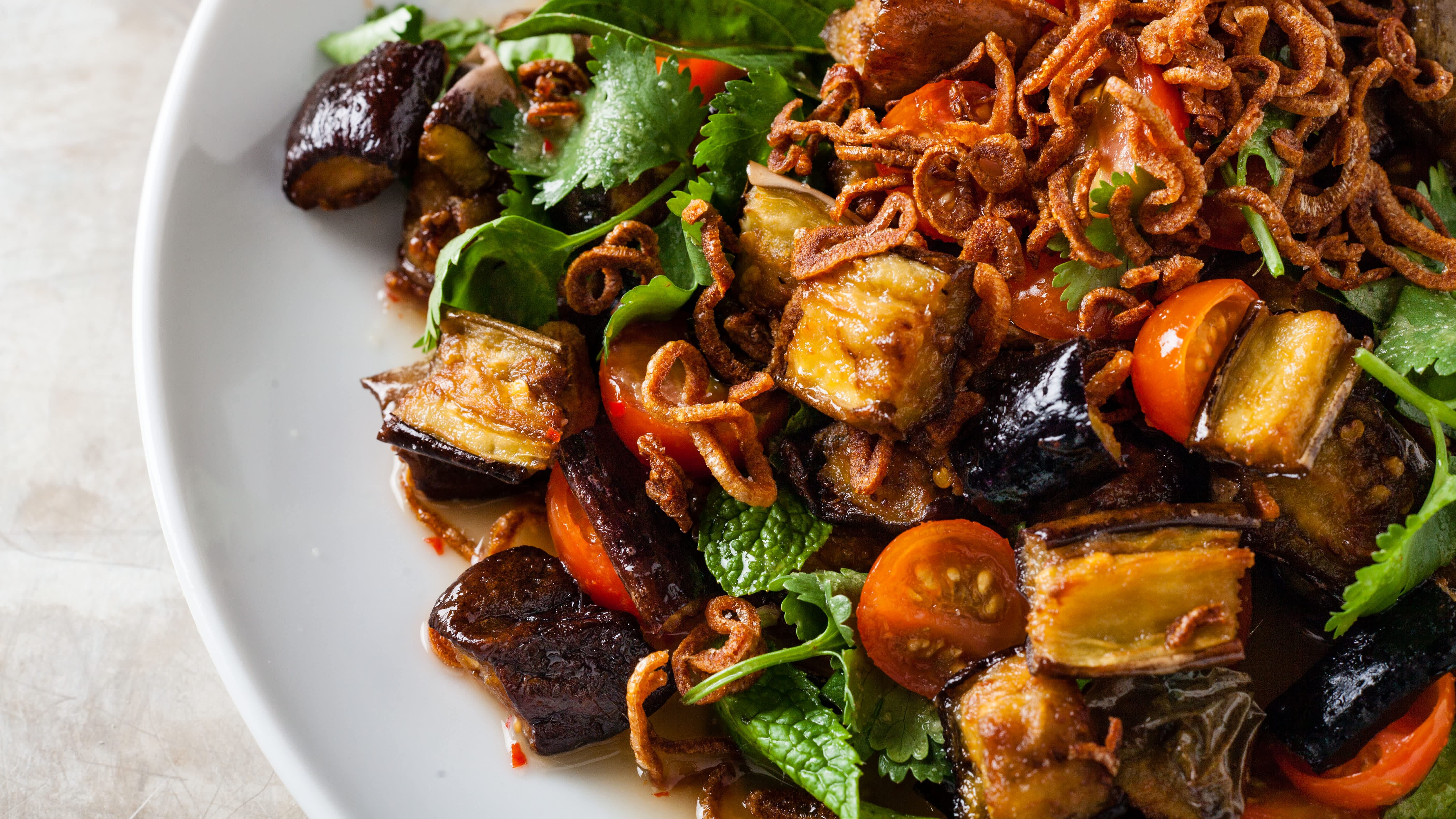 Crispy Eggplant Salad with Tomatoes, Herbs, and Fried Shallots
