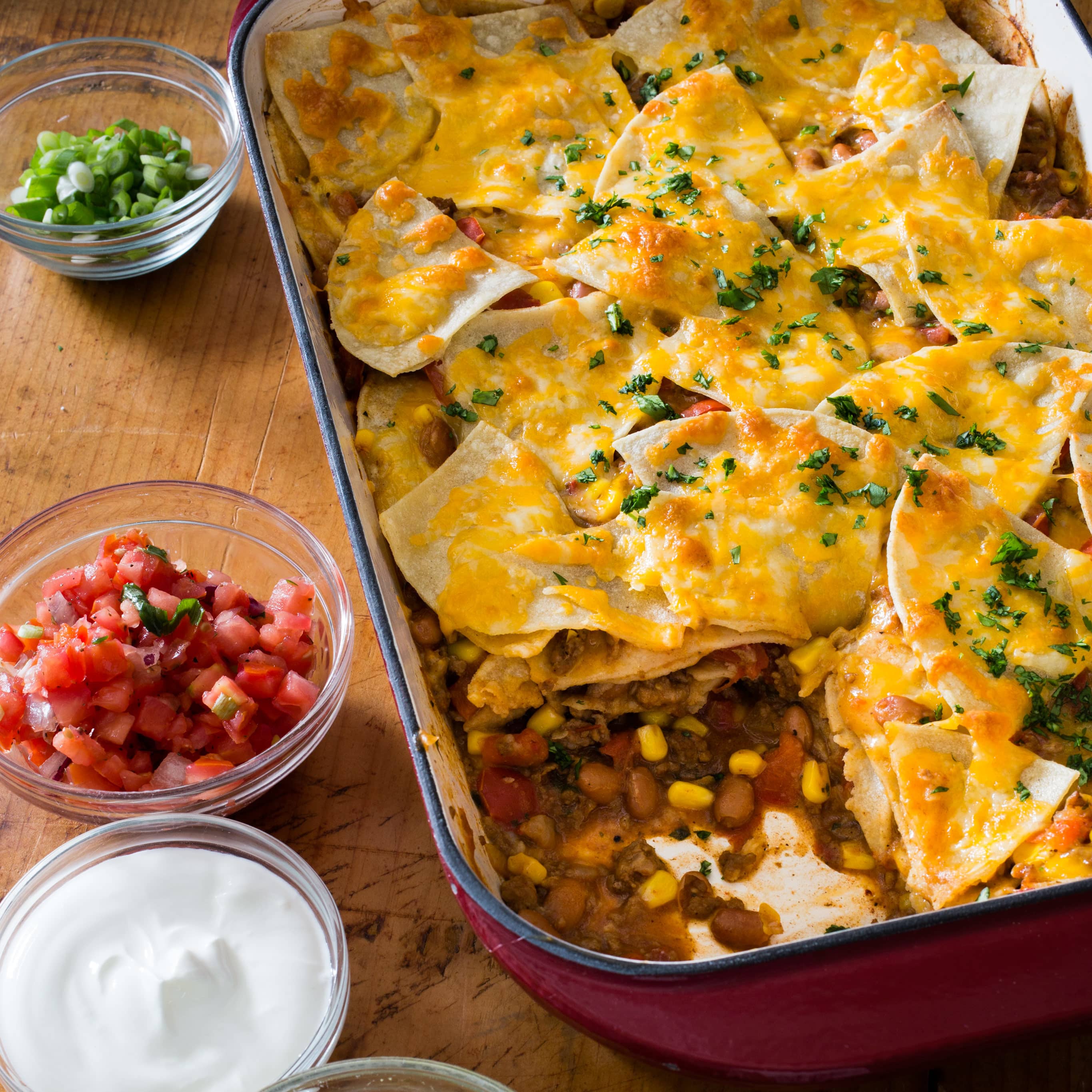 Mexican Lasagna with Pork, Corn, and Pinto Beans | America's Test Kitchen